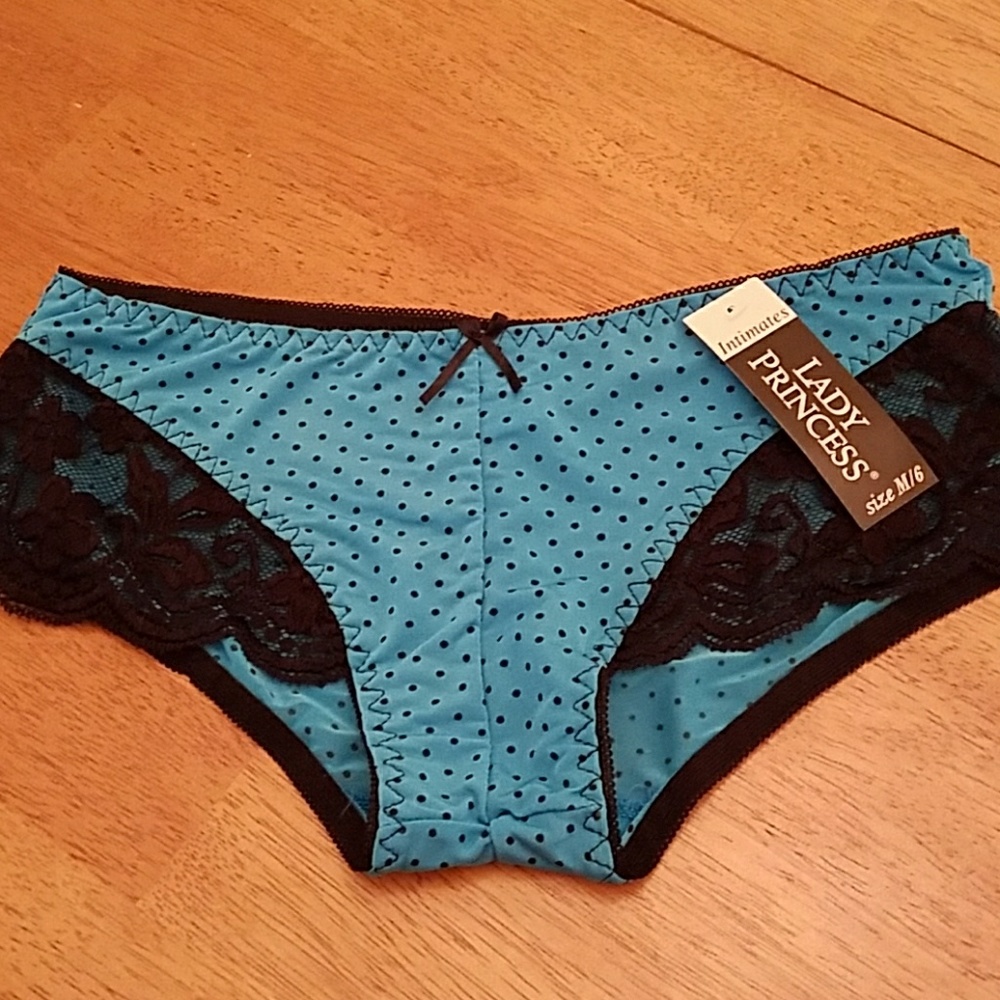 Stylish turquoise panties with black polka dots